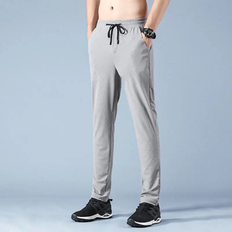 

Summer Breathable Thin Style Ice Shreds Quick Drying Mesh Motion Nine Points Men Loose Casual Solid Color Drawstring Trousers