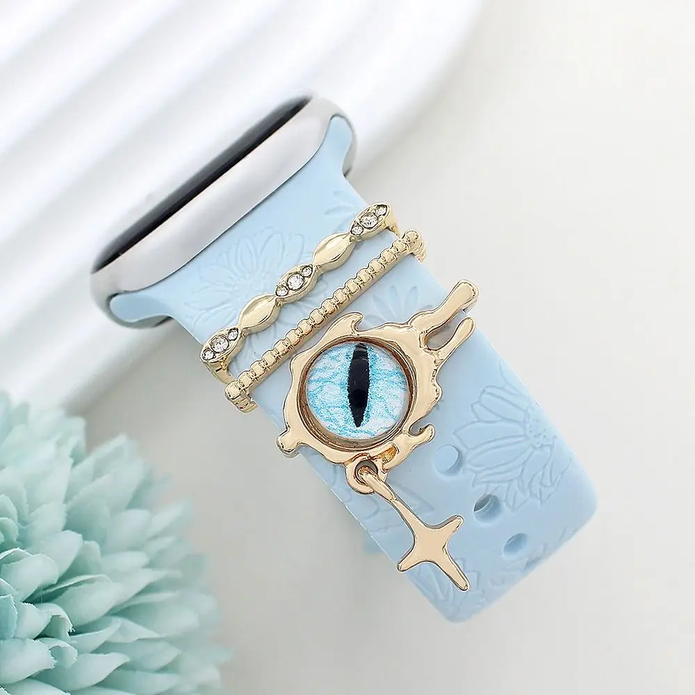 สายรัดโลหะตกแต่งแหวนเครื่องประดับเพชรสร้อยข้อมือตกแต่งตาสีฟ้า Charms เครื่องประดับสําหรับ Apple Watch Band