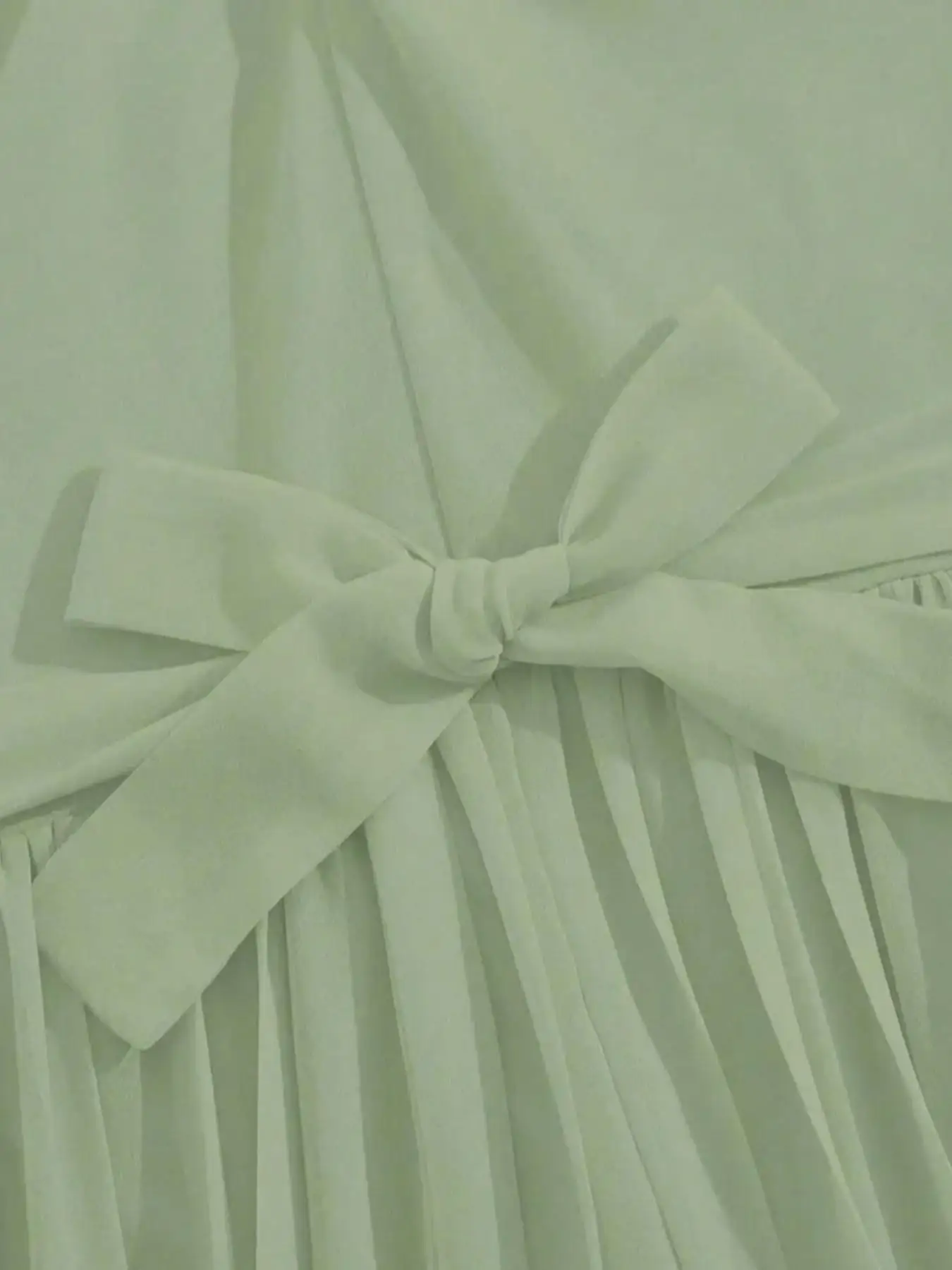Eleganter ärmelloser Jumpsuit mit Kreuzhalsausschnitt, gerafftem Schmetterlingsknoten, schmaler Passform, lässiges Mode-Partykleid für Teenager-Mädchen. – Detail 7