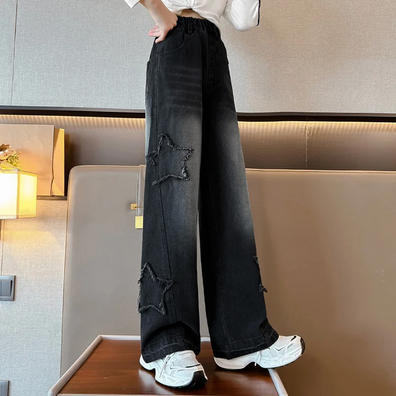 エレガントな子供黒色ジーンズ女の子のためのカジュアルストリートスタイルデニムパンツティーンエイジャー子供ファッションストレートジーンズズボンとスター