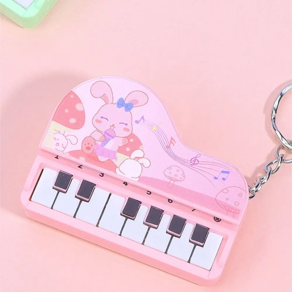 Solid Color Mini Electronic Piano Keychain Vertical Rabbit Mini Piano Key Pendant Audible Bear Musical Instrument Piano Keyring