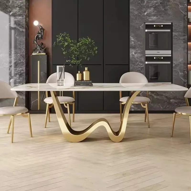 Rectangular dining table with marble-topped stainless steel frame chairs