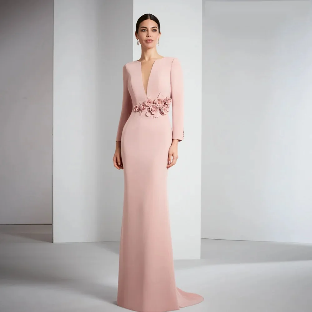 Light pink V-neck long-sleeve maxi dress with shaping design to slim your figure, delicate small flowers adorn the waist. Its fl