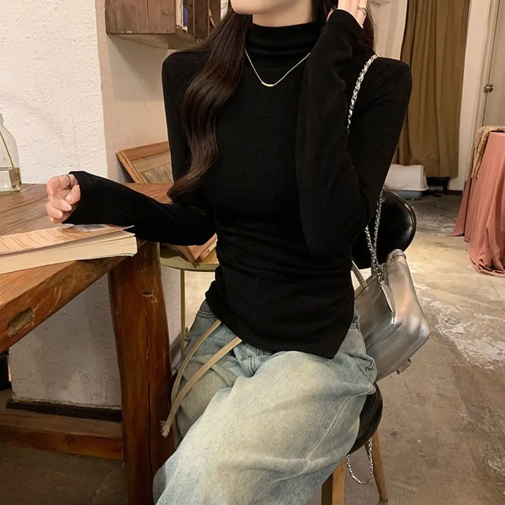 เสื้อยืดแขนยาวทรงไม่สมมาตร คอสูงครึ่งตัว เรียบง่าย ทรงเข้ารูป บางเบา สไตล์เก๋ เสื้อครอปท็อปสำหรับผู้หญิง แฟชั่น Y2k ฤดูใบไม้ผลิ