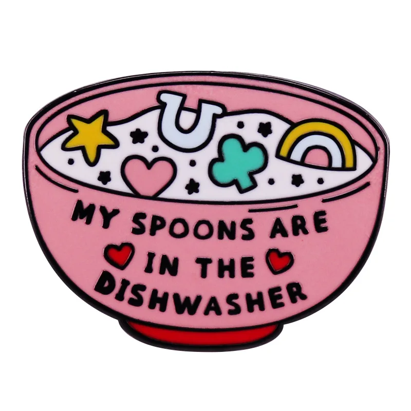 My spoon is in the dishwasher with enamel pins, interesting hat and backpack decorations