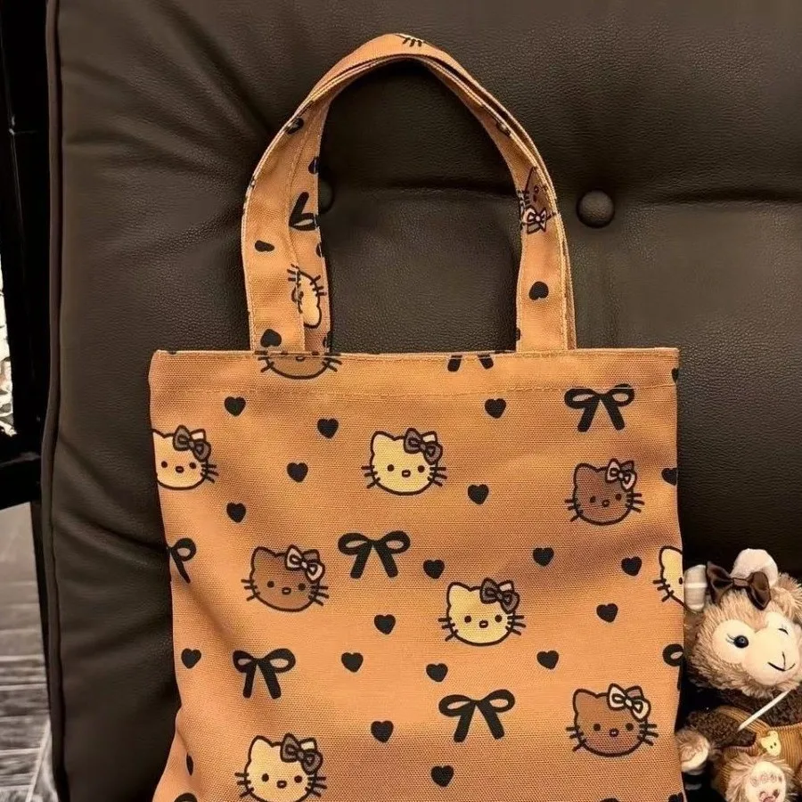 Novo dos desenhos animados sanrio olá kitty bolsa menina lona sacola kitty bonito grande capacidade saco de almoço versátil saco de armazenamento estudante