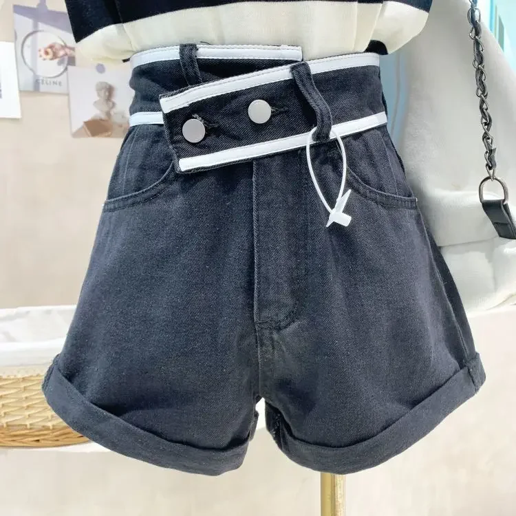 Slant waist design denim shorts female autumn 2024 new high waist loose hemming Joker slim A-shaped wide-leg hot pants.