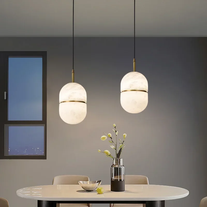 

Современная люстра из натурального мрамора в форме капсулы, подвесные светильники на медной основе, ресторан, гостиная, спальня, прикроватные подвесные светильники