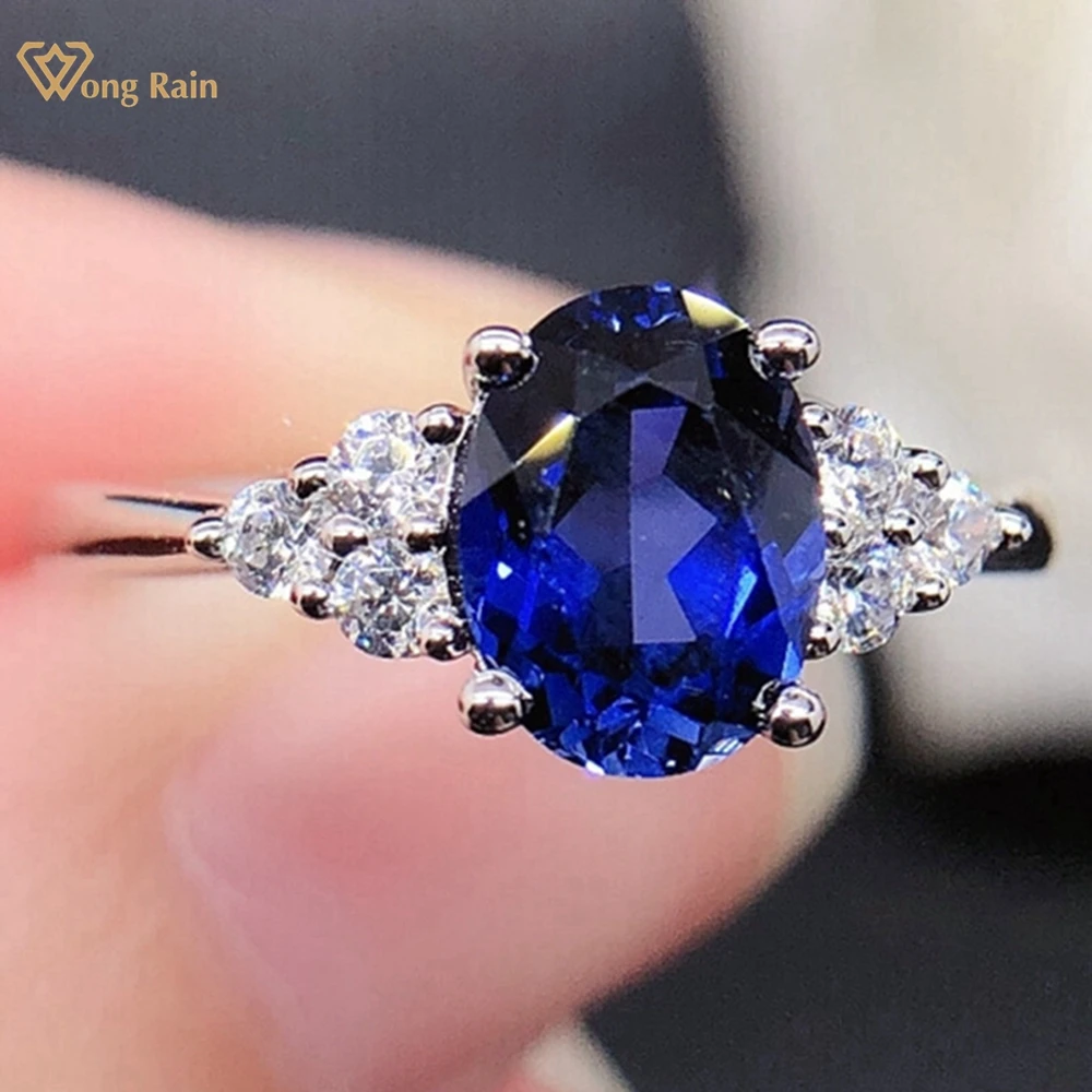 

Wong Rain Classic 925 Sterling Silver Oval 1.5CT Sapphire High Carbon Diamond Gemstone Engagement Jewelry Cocktail Party Ring