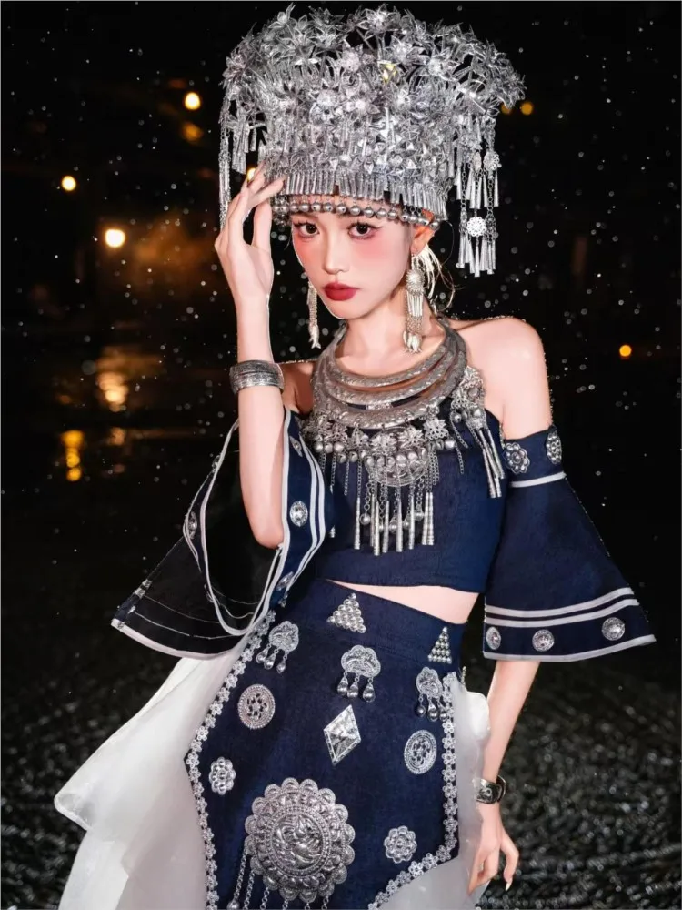 

A full set of ethnic style photos featuring deep blue strapless ribbon long dress hat and necklace