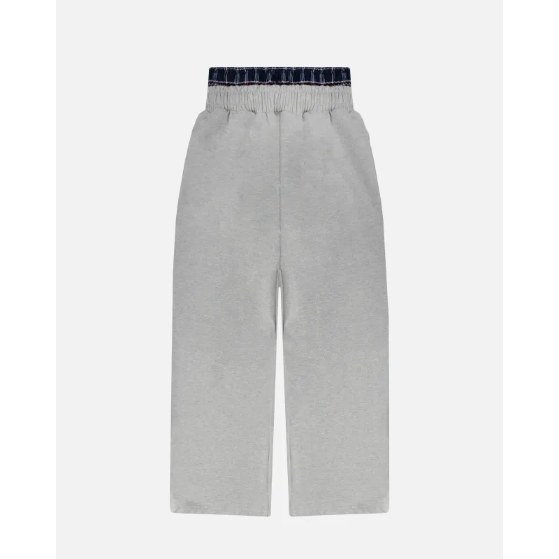 2025 Outono/Inverno Novo Europeu e Americano Harajuku Street cor sólida moda quente design de cintura dupla falsa calças de duas peças