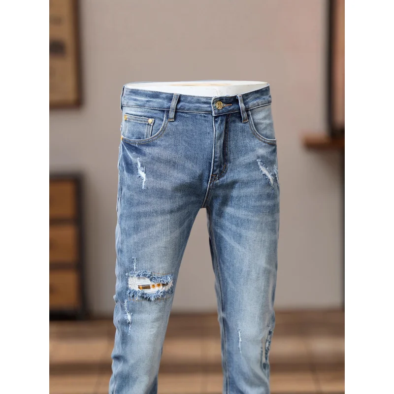 Jeans da uomo alla moda alla moda con fori 2025 Abbigliamento da uomo autunnale Pantaloni skinny elasticizzati slim fit alla moda lavati retrò