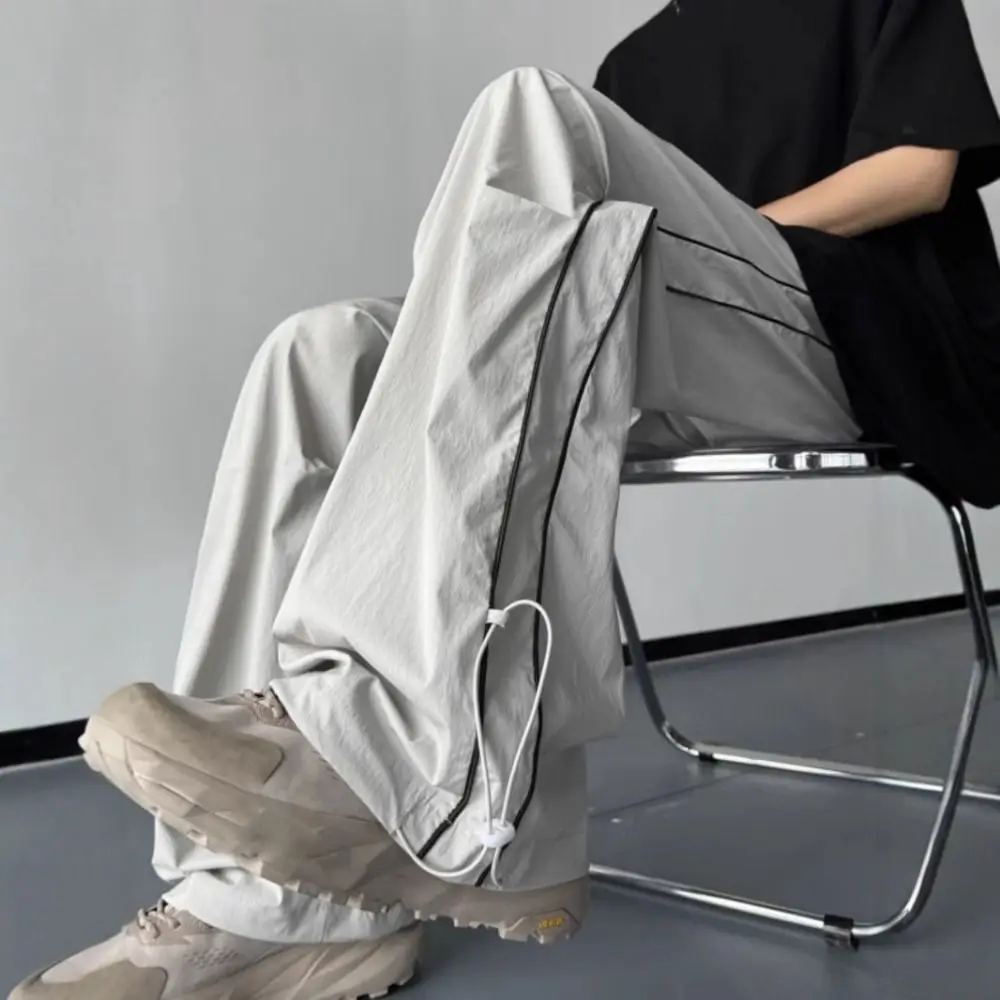 Ins نمط الرباط واسعة الساق Sweatpants شريط فضفاض فضفاض البضائع السراويل Y2K المتضخم الذكور ركض بنطلون الشارع الشهير