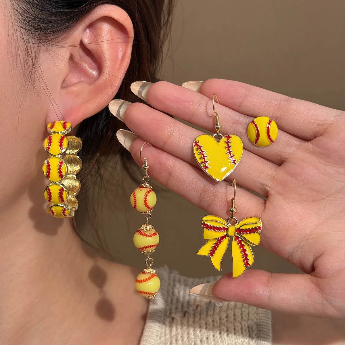 Sports competition, baseball elements, bow, heart, long tassel, red stripes, creative design, fashionable earrings