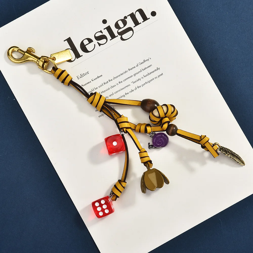 ثلاثي الألوان المنسوجة حبل الجلود النرد حقيبة مختلطة الديكور الإبداعية الأزياء سيارة المفاتيح الملحقات