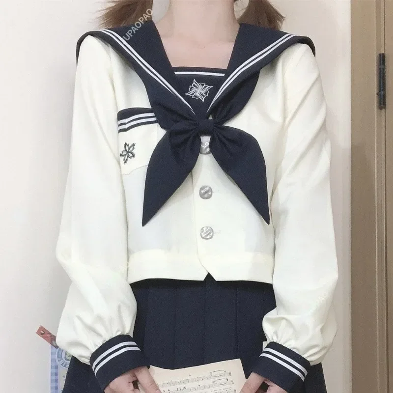 Ricamo giapponese Nuovo uniforme JK Stile Ins Uniforme da marinaio Stile college Abito con gonna a pieghe stile college a maniche lunghe Gioventù