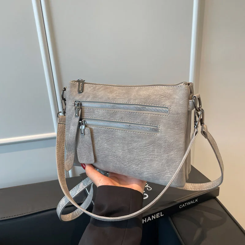 حقيبة يد نسائية جديدة متعددة الجيوب عالية الجودة من جلد البولي يوريثان الناعم حقيبة كتف نسائية فاخرة مصممة للفتيات حقيبة حمل Bolsas Sac