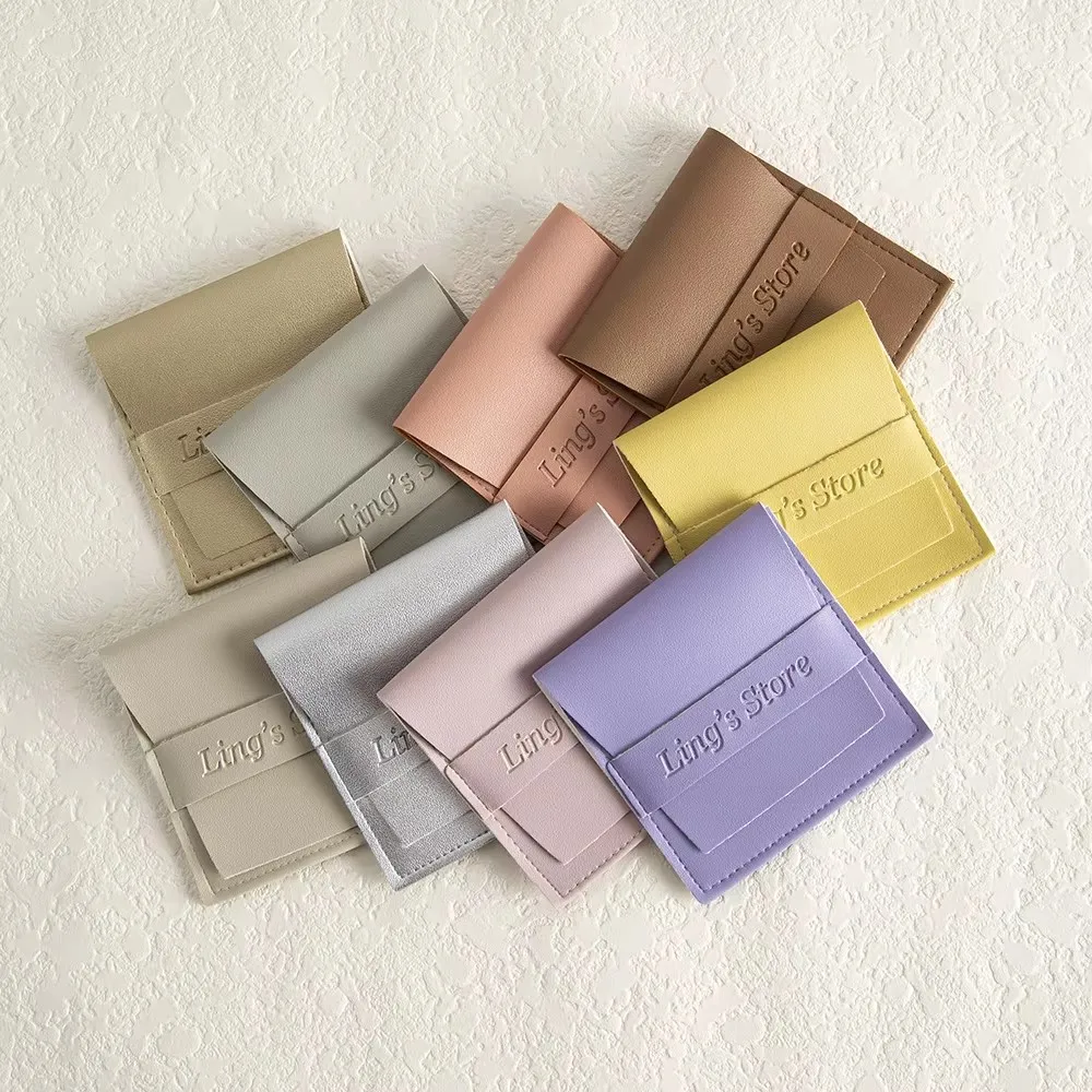 

Bulk 8x8cm PU Leather Strip Bag Jewelry Ring Studs Bracelet Pendant Custom Envelope Soft Smooth Gift Pouch USB Disk Storage Sack