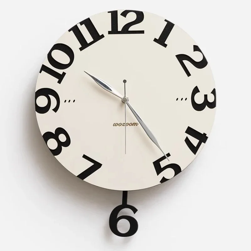 

Decorative wall clock for dining table. Living room hotel. Modern silent wall clock. Simple wooden home decoration. Wall clock.