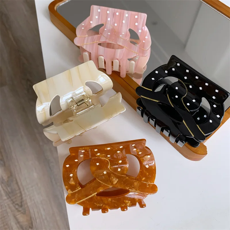 

Creative Retro Croissant Acetate Hair Claw Alkali Water Bread Claw Clips Fashion Lucky Knot Hair Clips Women Hair Accessories