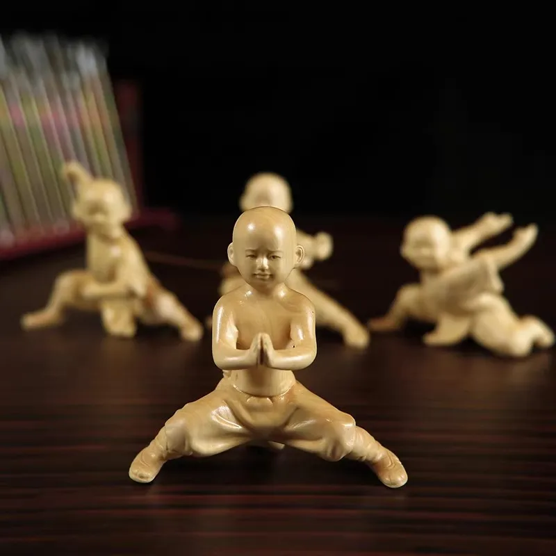Kung Fu Kid in Your Palm - Dynamic Boxwood Carving of a Little Monk, A Playful Handheld Sculpture & Energetic Accent for Desk