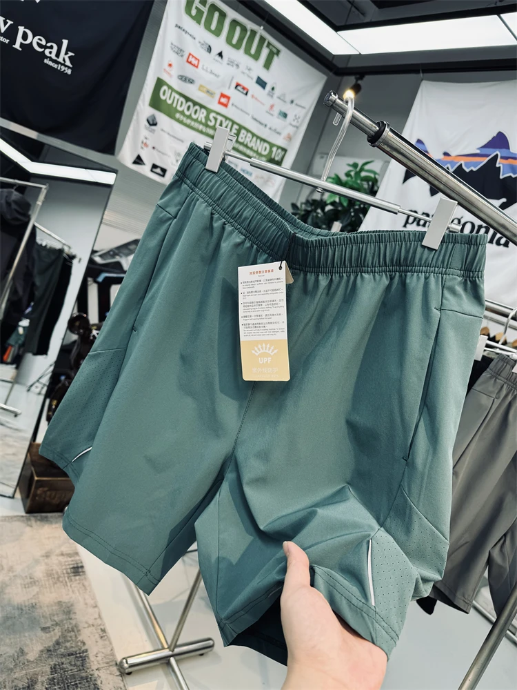 Quick Dry Elastic Laser Perforated Outdoor Running Pants Casual Shorts for Men And Women Fashionable Urban Style Polyester Blend