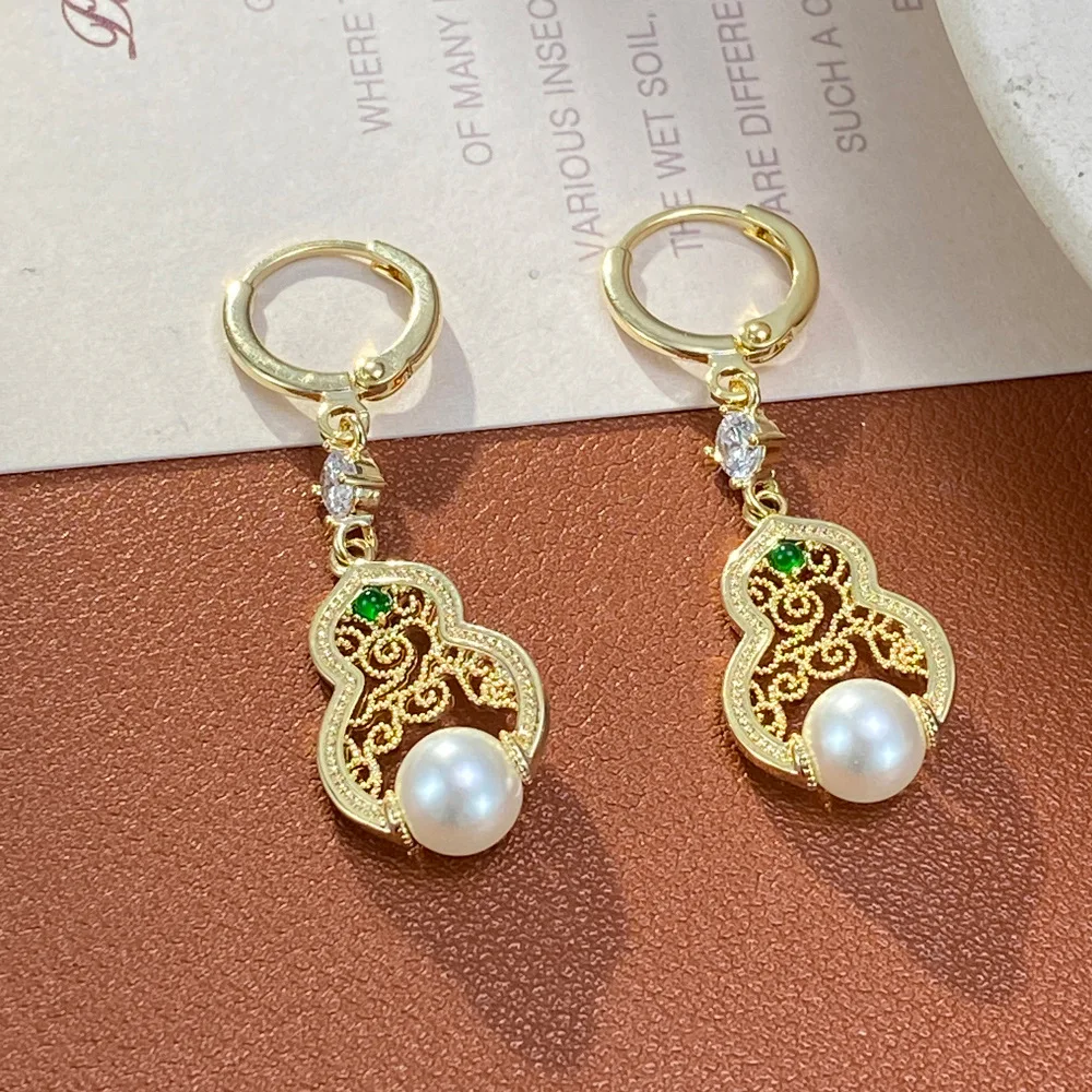 Niche fashion simple hollow gourd pearl ear buckle women's personality light luxury long versatile earrings