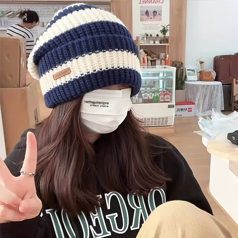 قبعة محبوكة مخططة على الموضة الكورية قبعة خفيفة الوزن للرجال والنساء دافئة مقاومة للرياح للخريف والشتاء مناسبة لركوب الدراجات في الهواء الطلق