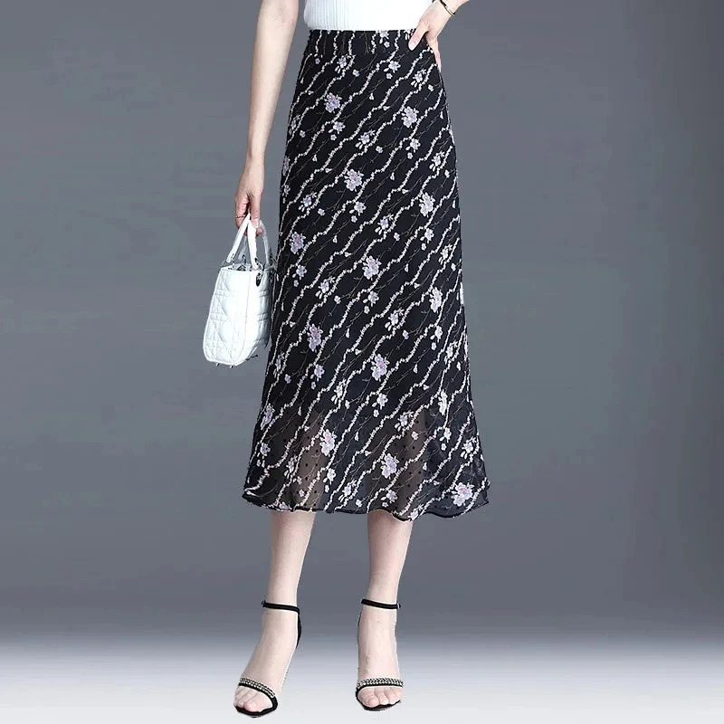 Printemps été nouvelle jupe Midi en mousseline de soie femmes taille haute a-ligne enveloppé jupes de hanche mode mince longues motifs floraux jupes 4XL