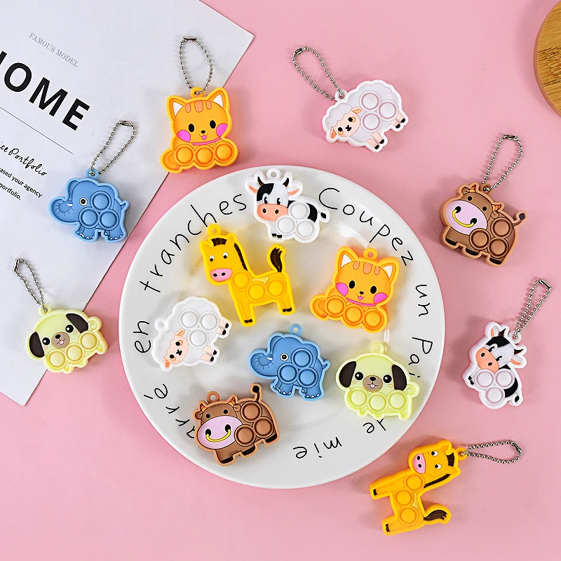 

7pcs Pop Fidget Toy Pack Kit Keychain Cartoon Animal Keychain Ring Party Favors Relief Hand Toys Birthday Party Favors for Kids