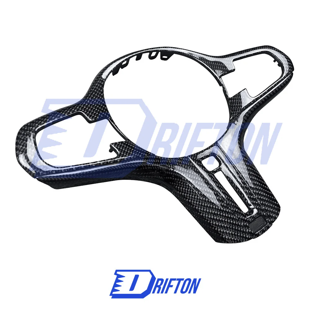 

Сменная центральная накладка на руль из углеродного волокна для комплектов интерьера BMW G82 M4 G80 M3