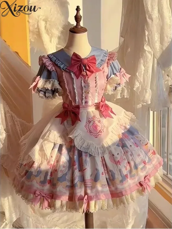 2025 Blu Rosa Lolita OP Abito Grembiule Colletto finto Fiocco Bambola Torta da principessa Stampa cartone animato Vita alta Puffy Festa di compleanno Estate