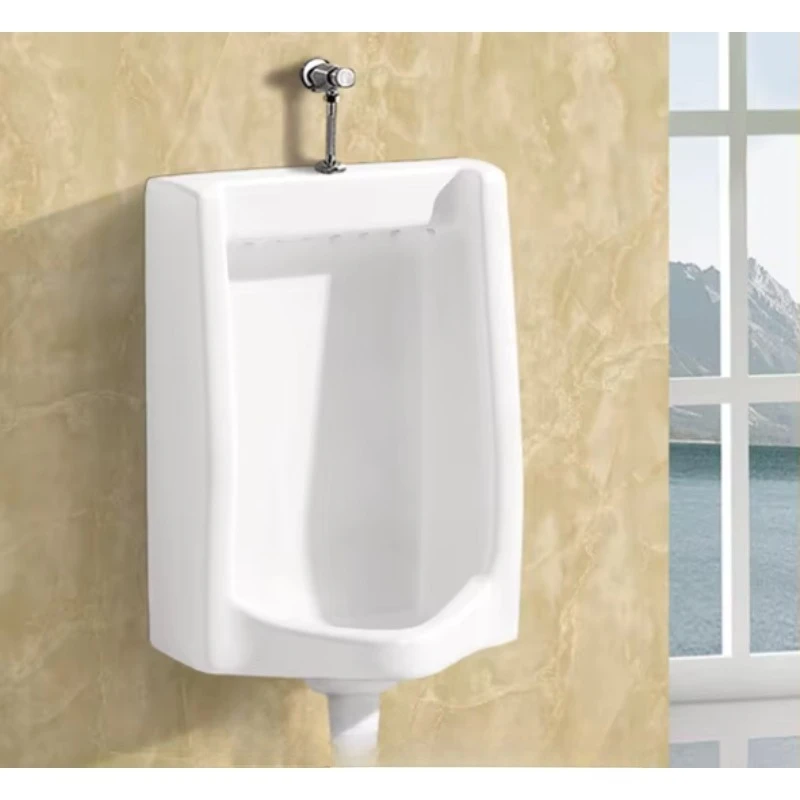 

Modern induction ceramic toilet men's urinal installed against the wall public toilet