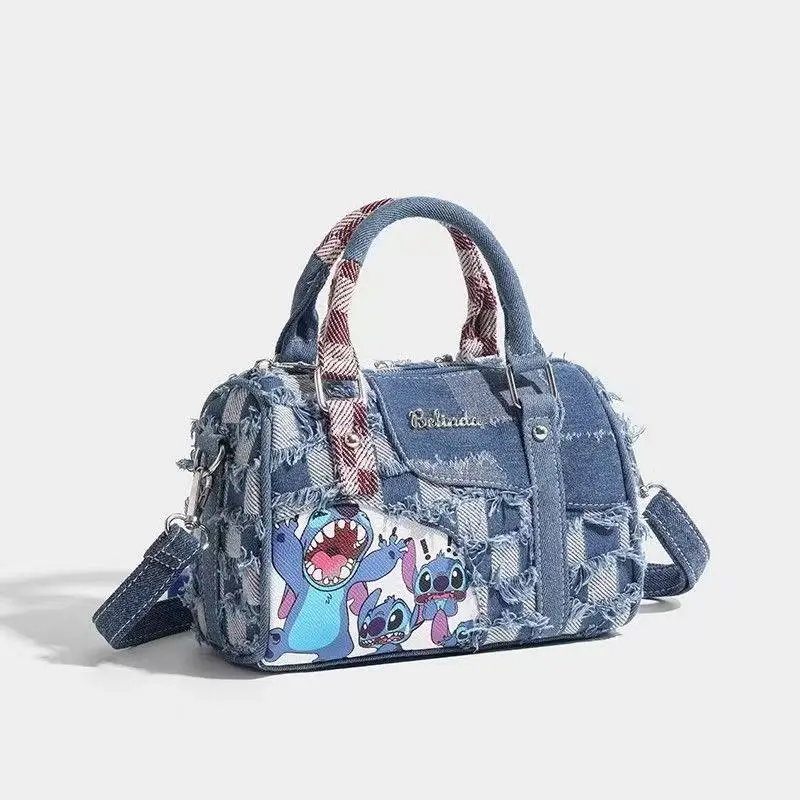 Zerrissene Denim-Tasche mit Cartoon-Stich, gespleißte diagonale Kreuztasche, handgehaltene Kissentasche, Denim-Boston-Tasche