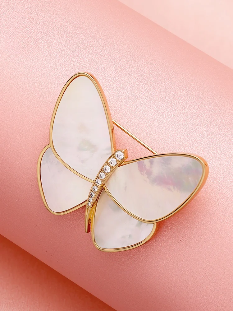 

Natural fritillary shell butterfly brooch