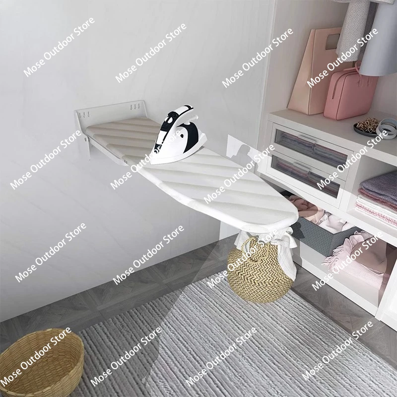 

Wall-mounted household folding wardrobe with ironing board hidden inside.