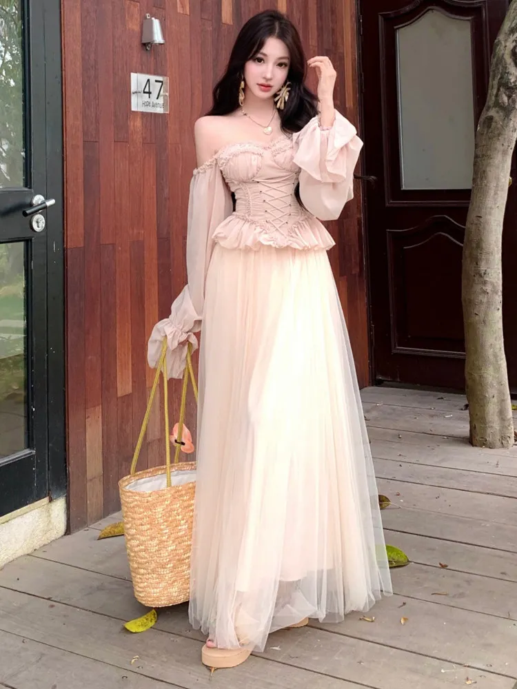 

Light luxury elegant two piece set women spring off shoulder trumpet long sleeved slim fit top high waist mesh long skirt