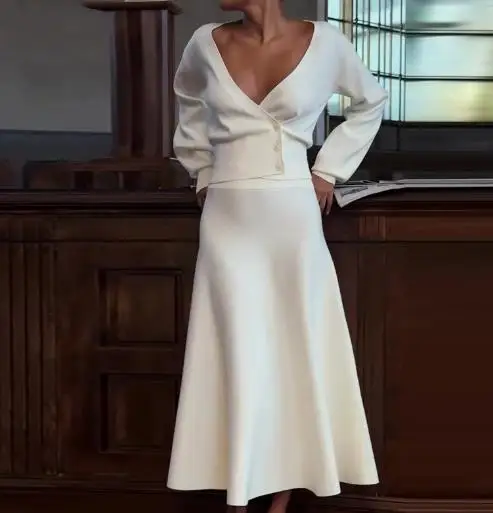 

Осенний новый женский однотонный комплект из двух предметов с длинным рукавом и глубоким V-образным вырезом, топ на пуговицах и юбка-миди