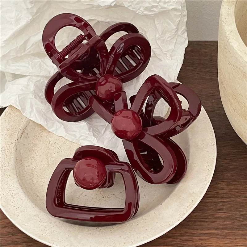 New for autumn and winter burgundy plastic cross bow disc hair grab clip cute red round ball hairpin hair grab.