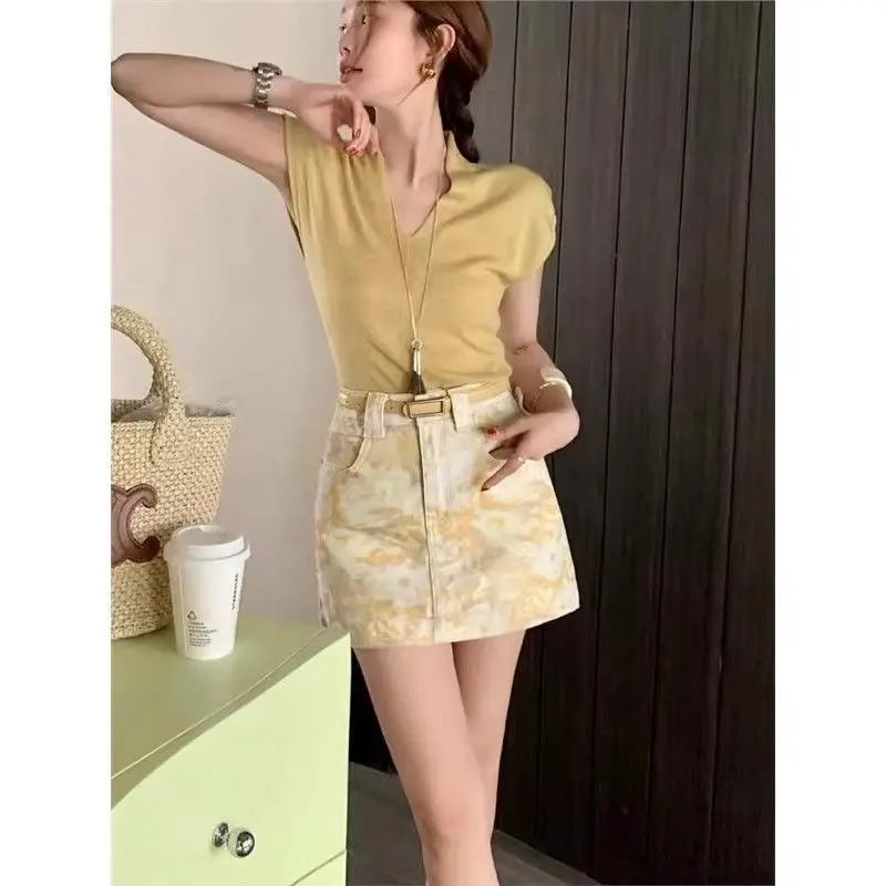 2025 nouvelle mode jaune cravate-teinture Denim jupe femmes taille haute mince jupe courte
