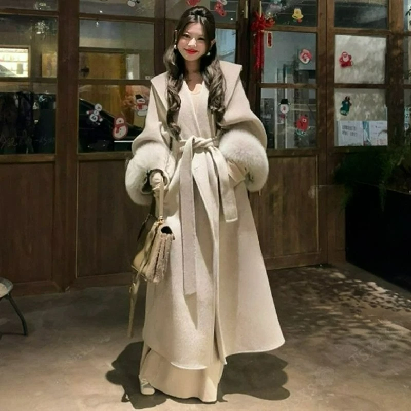 معطف صوفي جديد على الطراز الكوري لخريف/شتاء 2026 سترة صوفية طويلة عصرية بأكمام منفوشة للأشخاص القصيرين #1