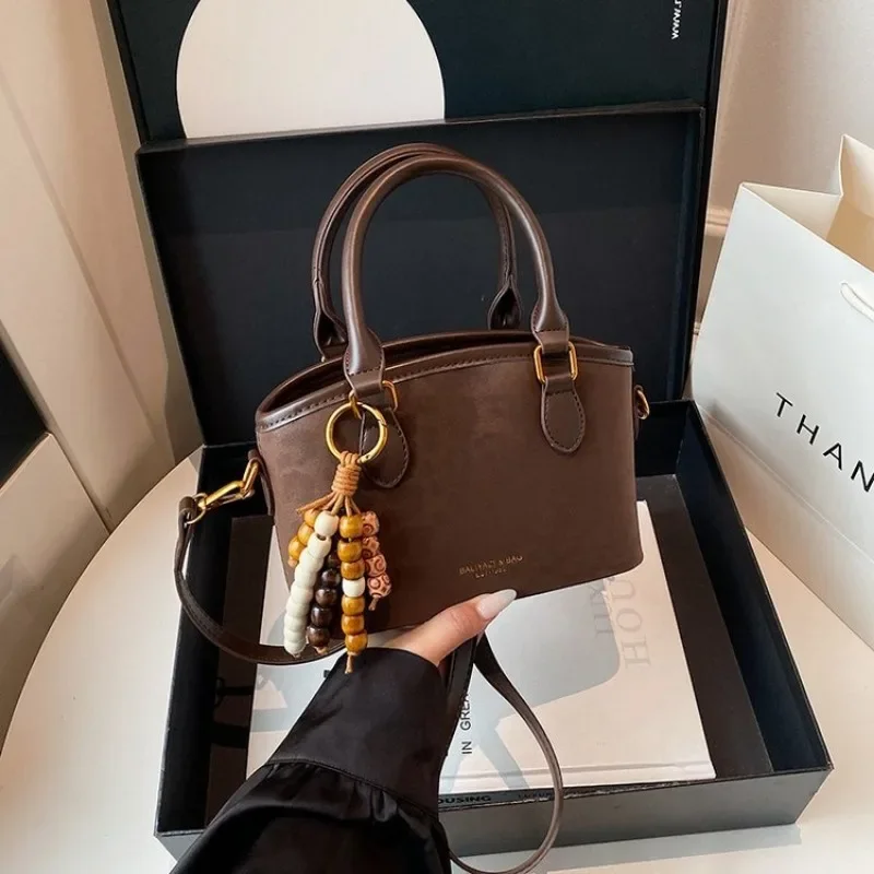 Stylish Luxury Vintage Diaper Bag A Trendy Designer Leather Shoulder Tote With Letter Logo For The Chic Commuter