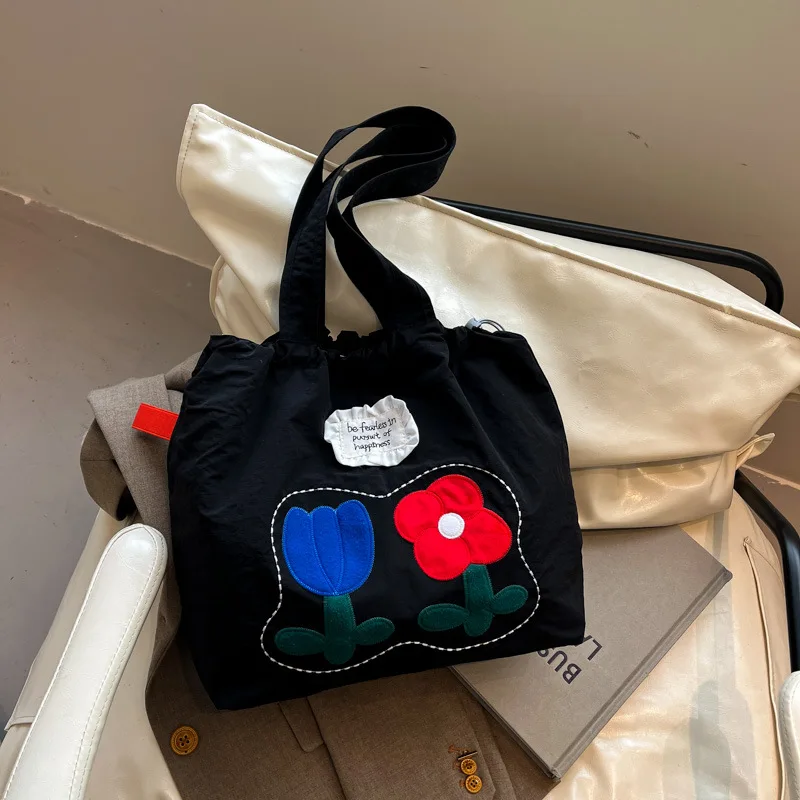 2025 nuevo bolso de hombro de flores de verano de gran capacidad Edición coreana lindo bolso de mano de ocio bolso de compras de gran capacidad bolso de lona