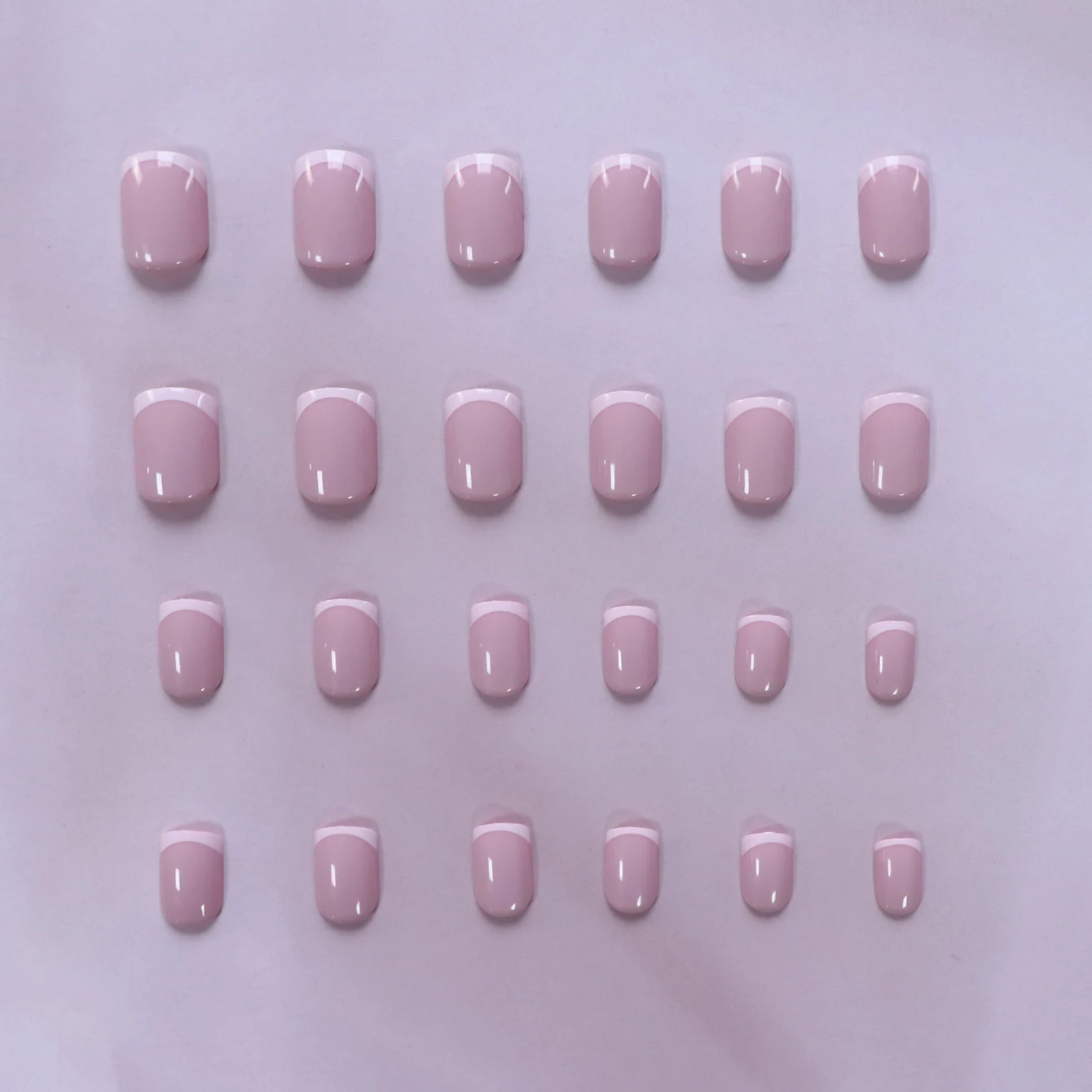 24 PCS Medium Almond Shaped Fake Nails, Light Pink  French Edge, Press On Nails Heart Design, 1PC Nail File & 1Nail Glue Sticker