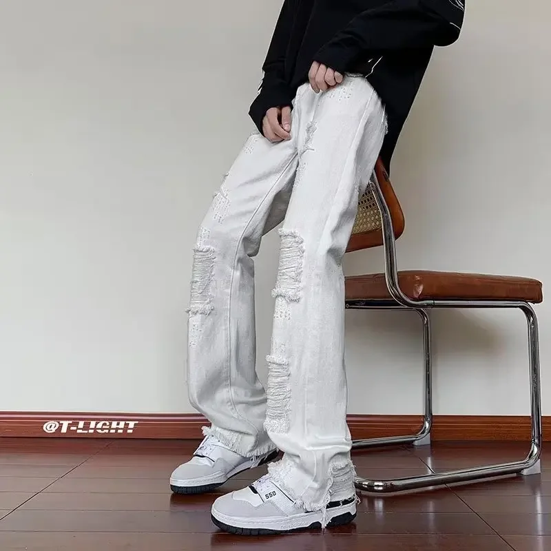 

European and American Fashion Men's New Ripped and Fringed Slightly Flared High-end Slim-fit and Slimming Denim Trousers.