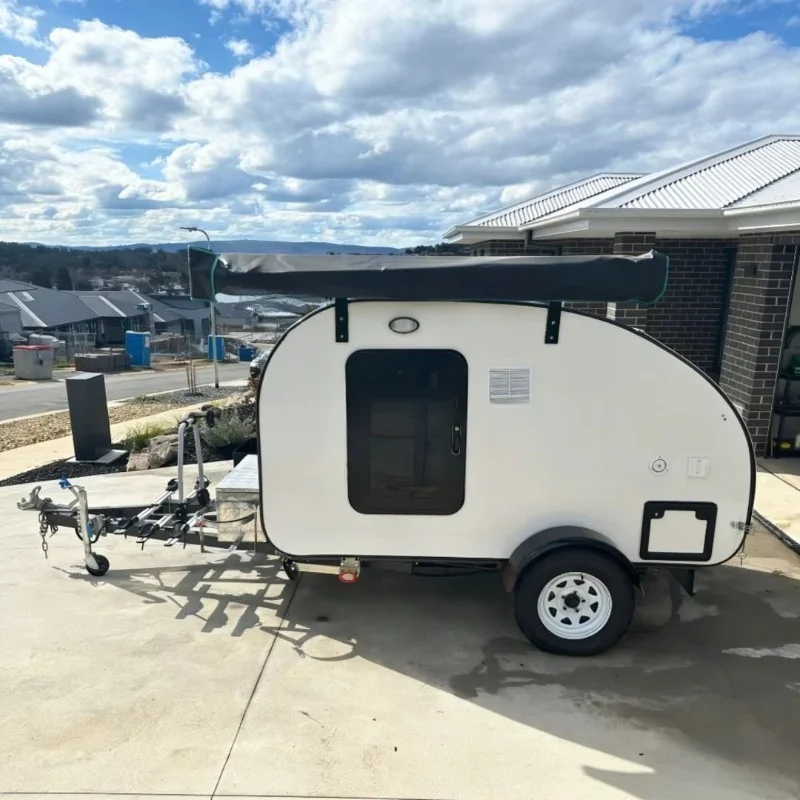 Custom Self-Contained Camper Van with Compact Bathroom, Refrigerator, and Outdoor Shower for Full Time Travel, Weekend Getaways