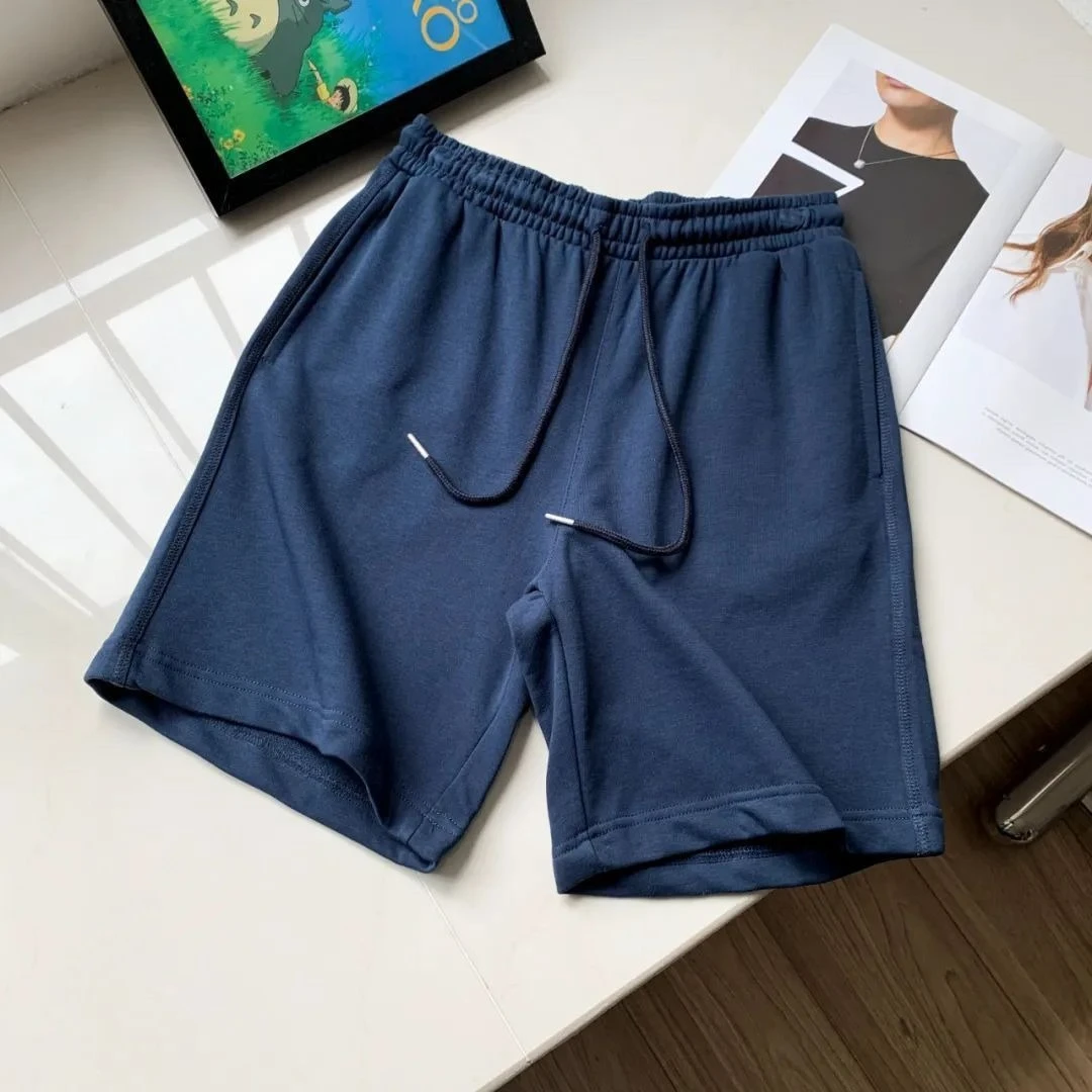 Celana pendek olahraga pria terry berkualitas tinggi katun murni Eropa versi bersih celana lima titik kasual serbaguna untuk bepergian pria
