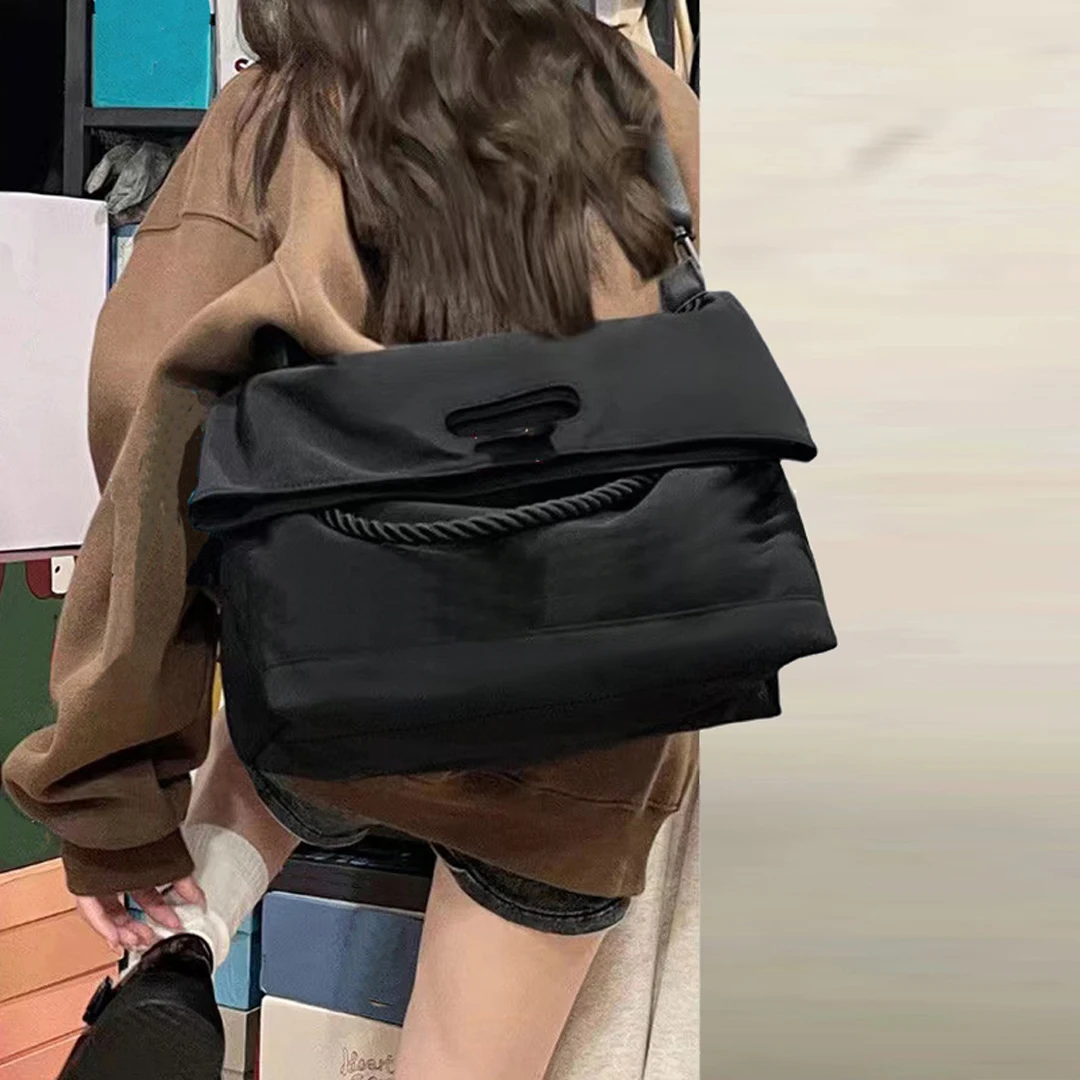

2025 new Oxford cloth tote bag for women, large capacity, twisted rope handbag, fashionable single shoulder cross-body mailbag