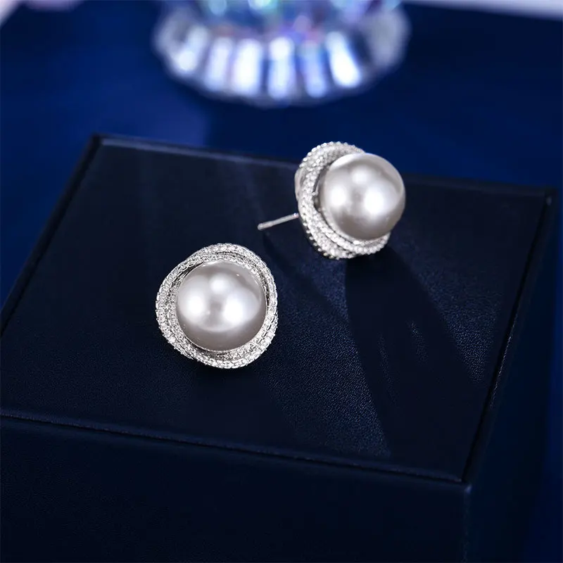High-end, niche commuting earrings with a light luxury style, zirconia 925 silver needle, simple and elegant pearl stud earrings