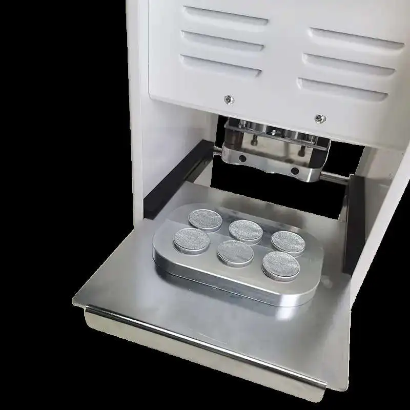 Termosigillatrice manuale per capsule di caffè in foglio di alluminio a 6 cavità
